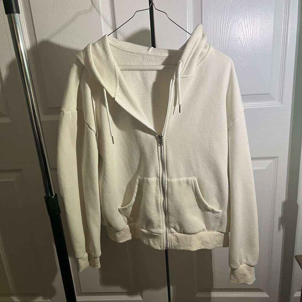 white zip up